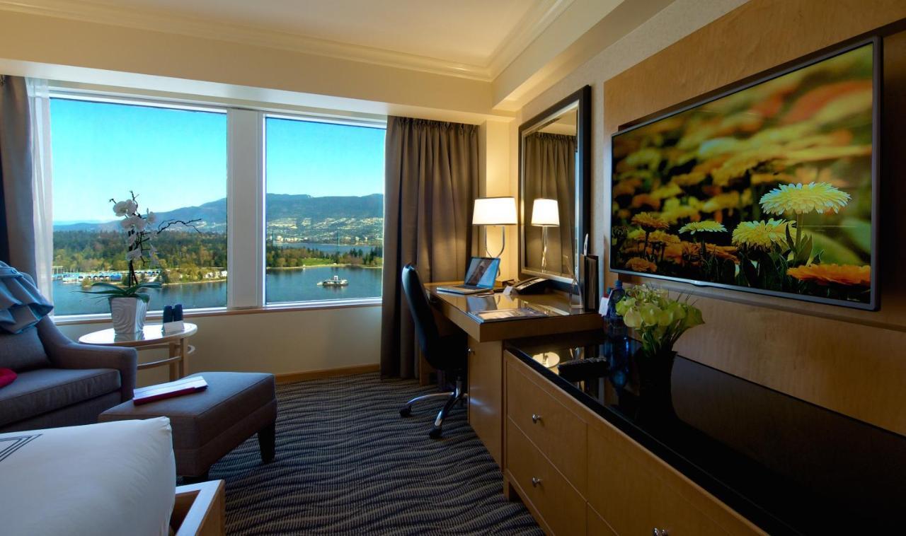 Deluxe Zimmer mit Kingsize-Bett und Hafenblick